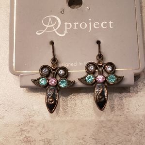 Beautiful antique looking earrings with purple, blue and turquoise stones.